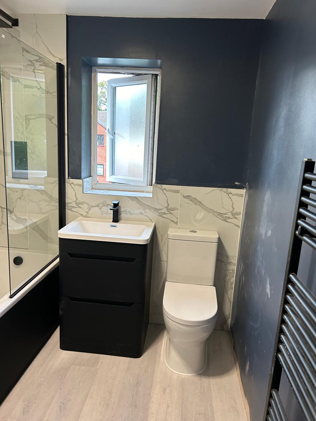 Navy and marble bathroom