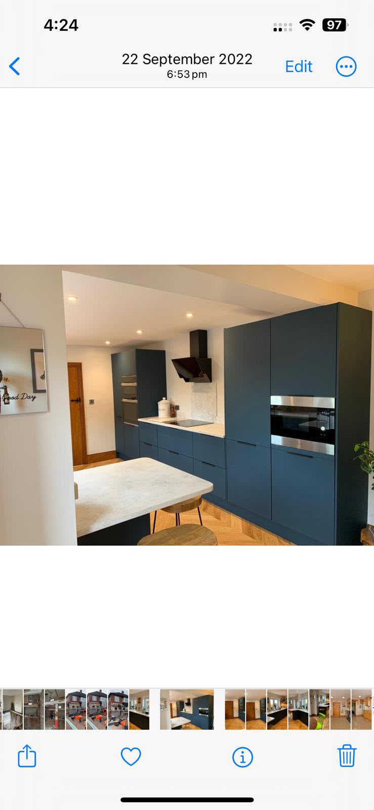 Dark blue fitted kitchen